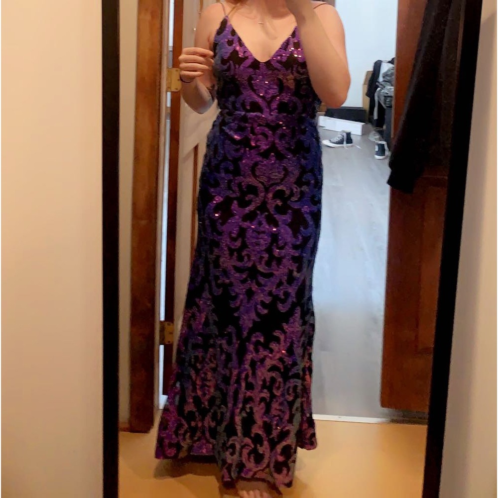 Windsor’s purple sequence prom dress. Six Xs fits like a small